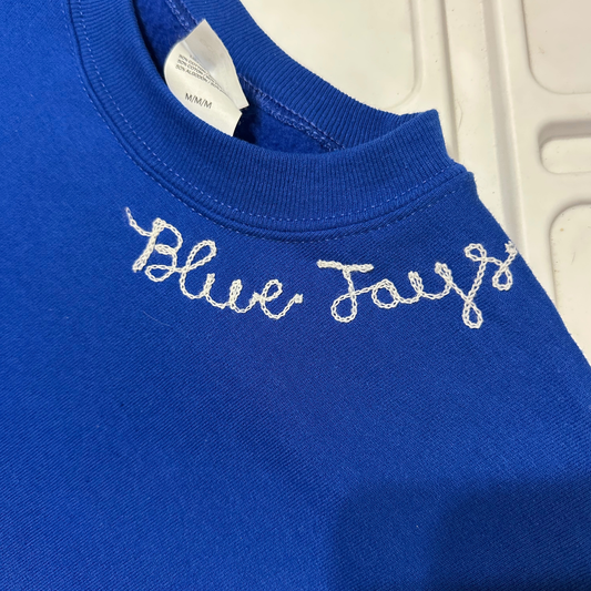 Blue Sweatshirt with White Chainstitch Collar Blue Jays